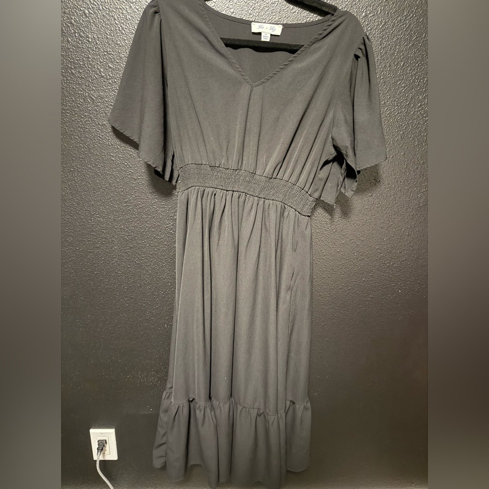 Black Shesky Dress with sleeves.